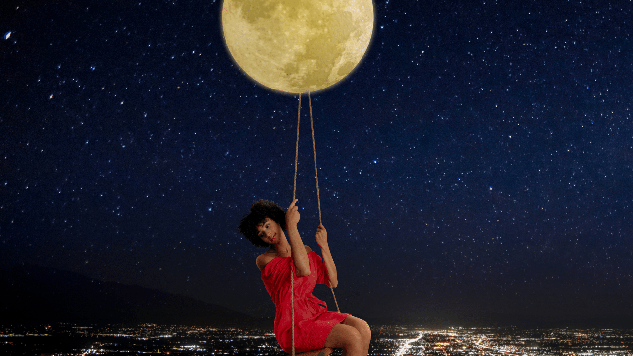 Woman swinging on moon